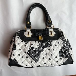 Iron Fist skull & bow tie white/black faux leather handbag w padlock
